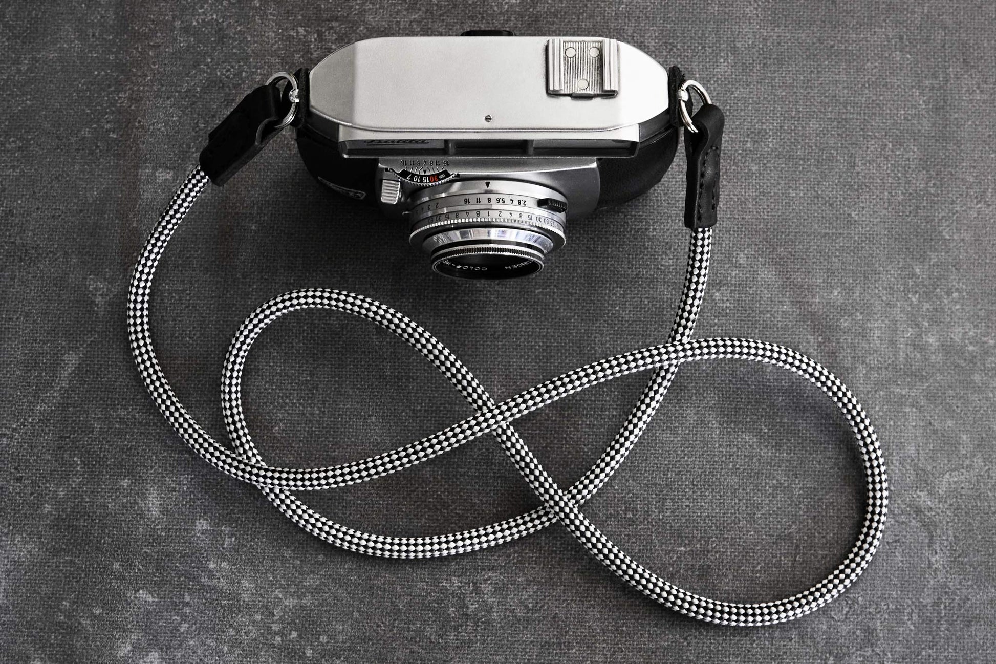 Audrey rope camera strap handcrafted by Henry and Wilde fitted to vintage film camera.