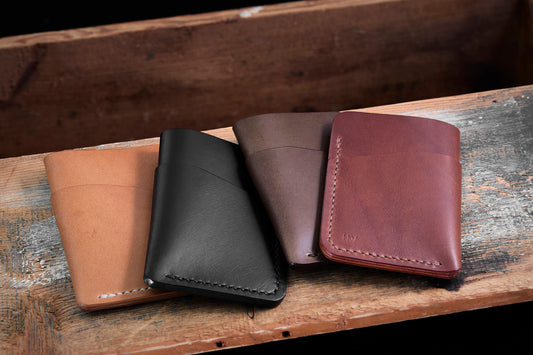 Henry and Wilde Henry leather card holder wallets showing the four premium colour options side by side.